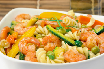 Shrimp and vegetables fusilli pasta salad close