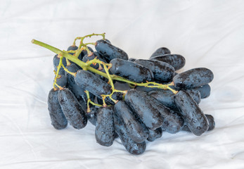 A bunch of ripe gold-fingered hetty grapes