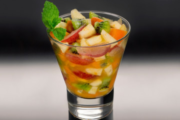 Fruit salad in black gradient background