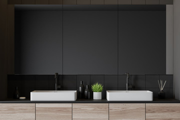 Close up of double sink in gray bathroom