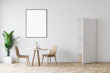 White dining room interior with poster