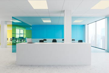 Reception desk in blue and yellow office