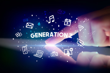 Finger touching tablet with drawn social media icons and GENERATION Z inscription, social networking concept