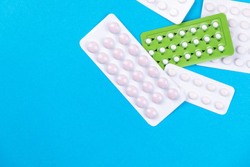 Tablets medicaments on a blue background