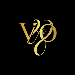 Initial letter V & O VO luxury art vector mark logo, gold color on black background.