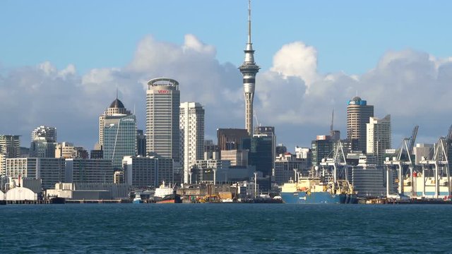Auckland, New Zealand harbour and city center with Auckland Sky Tower waterfront view from Devonport. Travel attraction in Auckland, New Zealand.