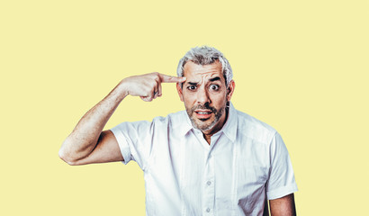 Are you crazy? gestures with his finger