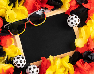blackboard with german fanart with balls and sunglasses