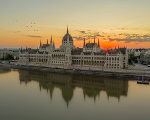 Fototapeta na wymiar Hungarian Parliamnet amazing morning lights. Reflected. Danube river