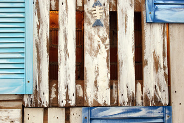 Wooden detailed plank wall with hanging fish decoration