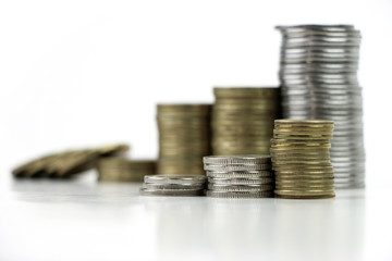 Golden and silver coins stack 