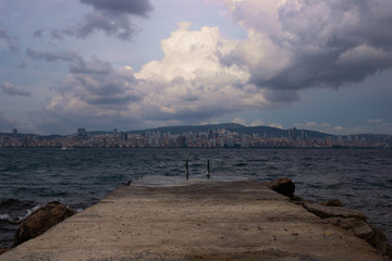 cloudy sky, seaside, cityscape