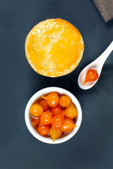 One Traditional Brazilian mini chicken pies called empada with pepper pout in slate background seen from above