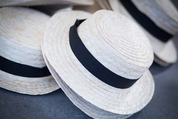 Fototapeta na wymiar Pile of straw hats