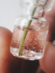 hand with glass of water