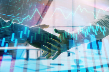 Multi exposure of financial graph on office background with two businessmen handshake. Concept of success in business