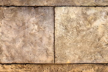 Background, texture of an antique wall made of blocks.
