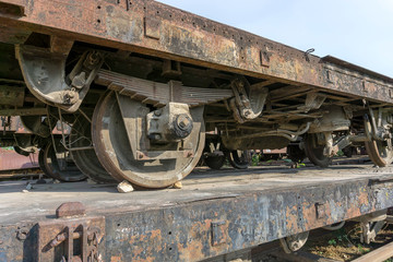 Fototapeta na wymiar Lopburi, THAILAND - Jun 6, 2019 : Lost places / Abandoned, rusty railroad wagon, where the paint peels off , Old trains with rust in Thailand