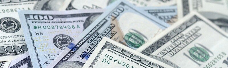 Many hundred dollar bills