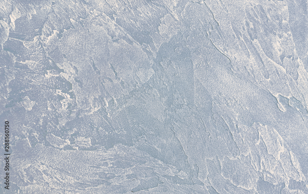 Poster beautiful abstract wall texture with decorative plaster with mixed shades of light gray and silvery.