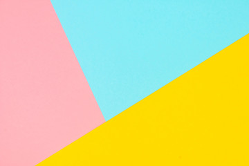 Pink, blue, yellow colored paper background