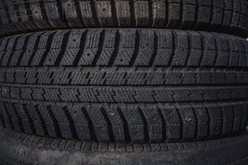 car rubber tires lying on top of each other.