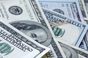 Many hundred dollar bills