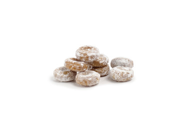  offee caramel in icing sugar on a white background