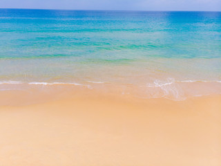 Aerial view sea wave white sand beach