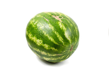 Ripe striped watermelon flawed isolated on white