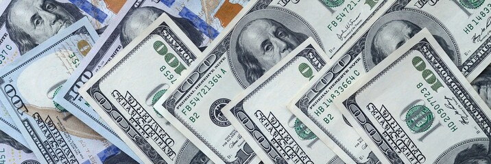 Many hundred dollar bills