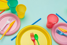 Set of colorful plastic dishware