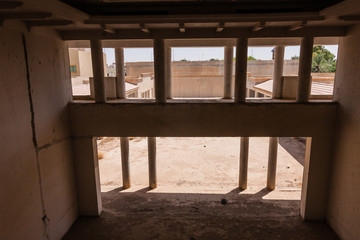 A garage and a view of the backyard of the abandoned luxury villa in Riyadh