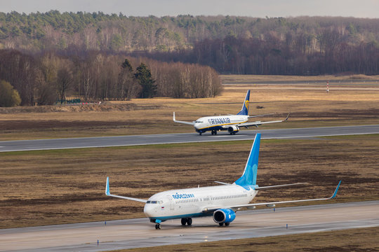 cologne, North Rhine-Westphalia/germany - 08 03 19: an ryanair and pobeda airplane at cologne bonn airport germany