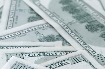 Many hundred dollar bills