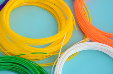 Plastic PLA and ABS filament material for printing on a 3D pen or printer of various colors - obrazy, fototapety, plakaty