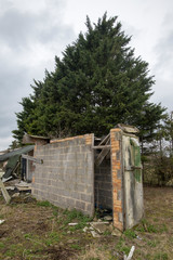 Old derelict buildings which are falling down in Snailwell, Suffolk. 30th March 2018