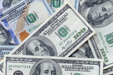Many hundred dollar bills