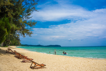 Fototapeta na wymiar Colorful beach chair on white sand beach