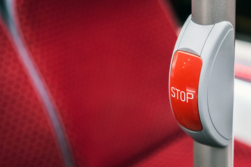 stop button modern and comfortable interior of the city bus. Convenient for disabled and elderly people. There is a dedicated Braille