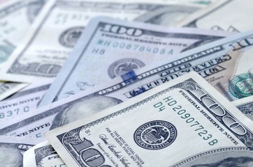 Many hundred dollar bills