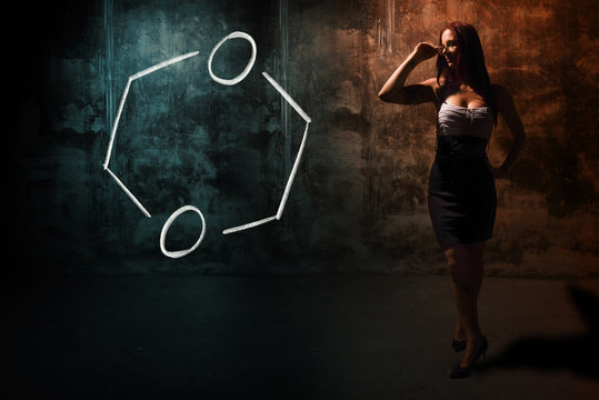 Sexy girl or secretary or female student presenting handdrawn chemical formula of Dioxane