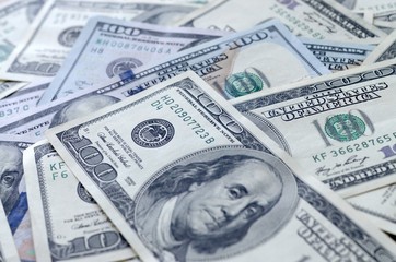 Many hundred dollar bills
