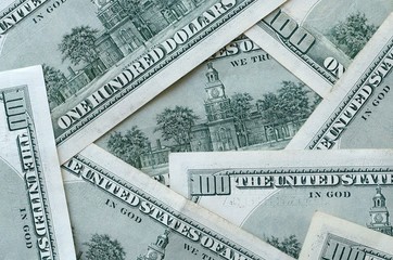 Many hundred dollar bills
