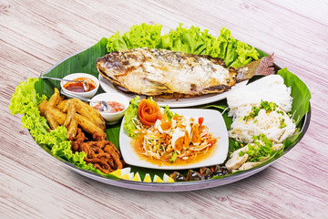 Grilled fish with salad
