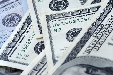 Many hundred dollar bills