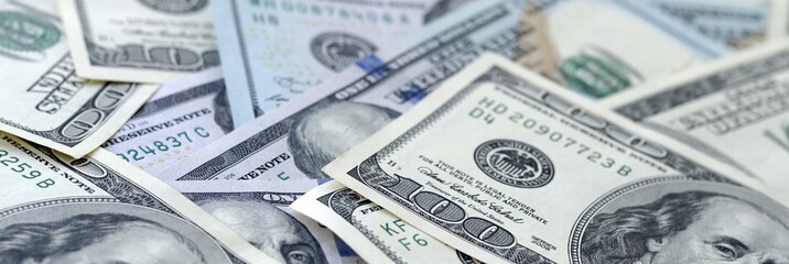 Many hundred dollar bills