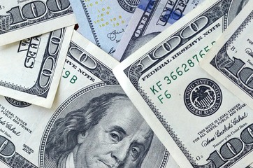 Many hundred dollar bills