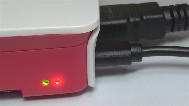 Connecting the connector to the Raspberry mini-computer, turning on the LED indicators