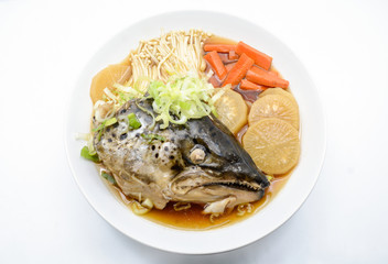 Soup Salmon in soy source with vegetables, Japanese foods